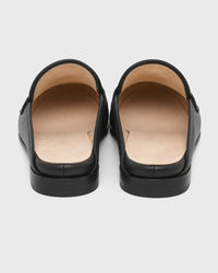 Black backless heel view