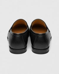 Black driving heel view