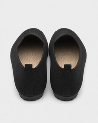 Black flat heel view