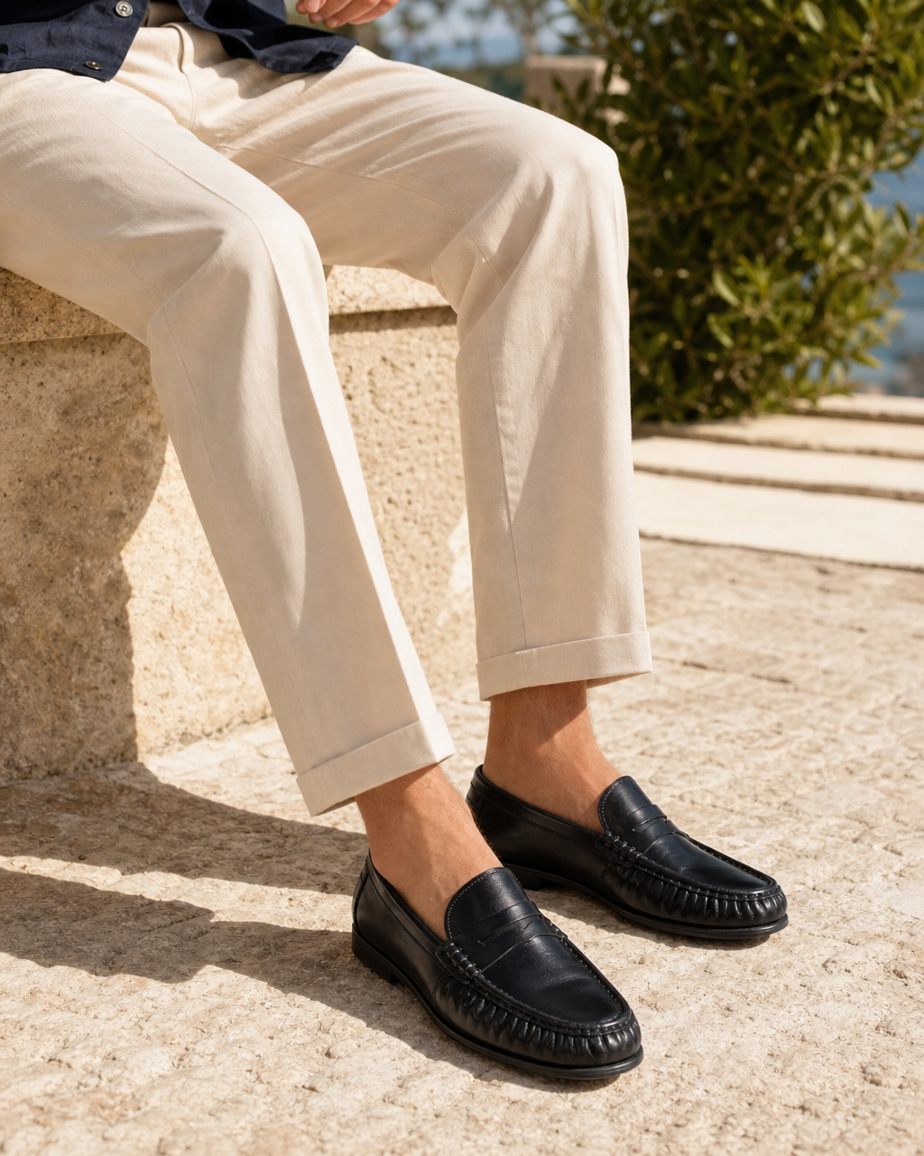 Man wearing black flat with linen trousers