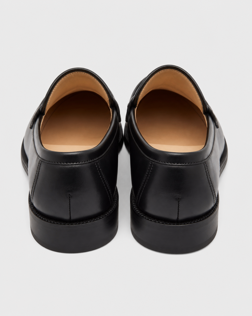 Black penny heel view