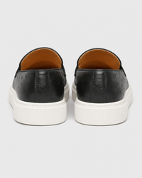Black penny heel view