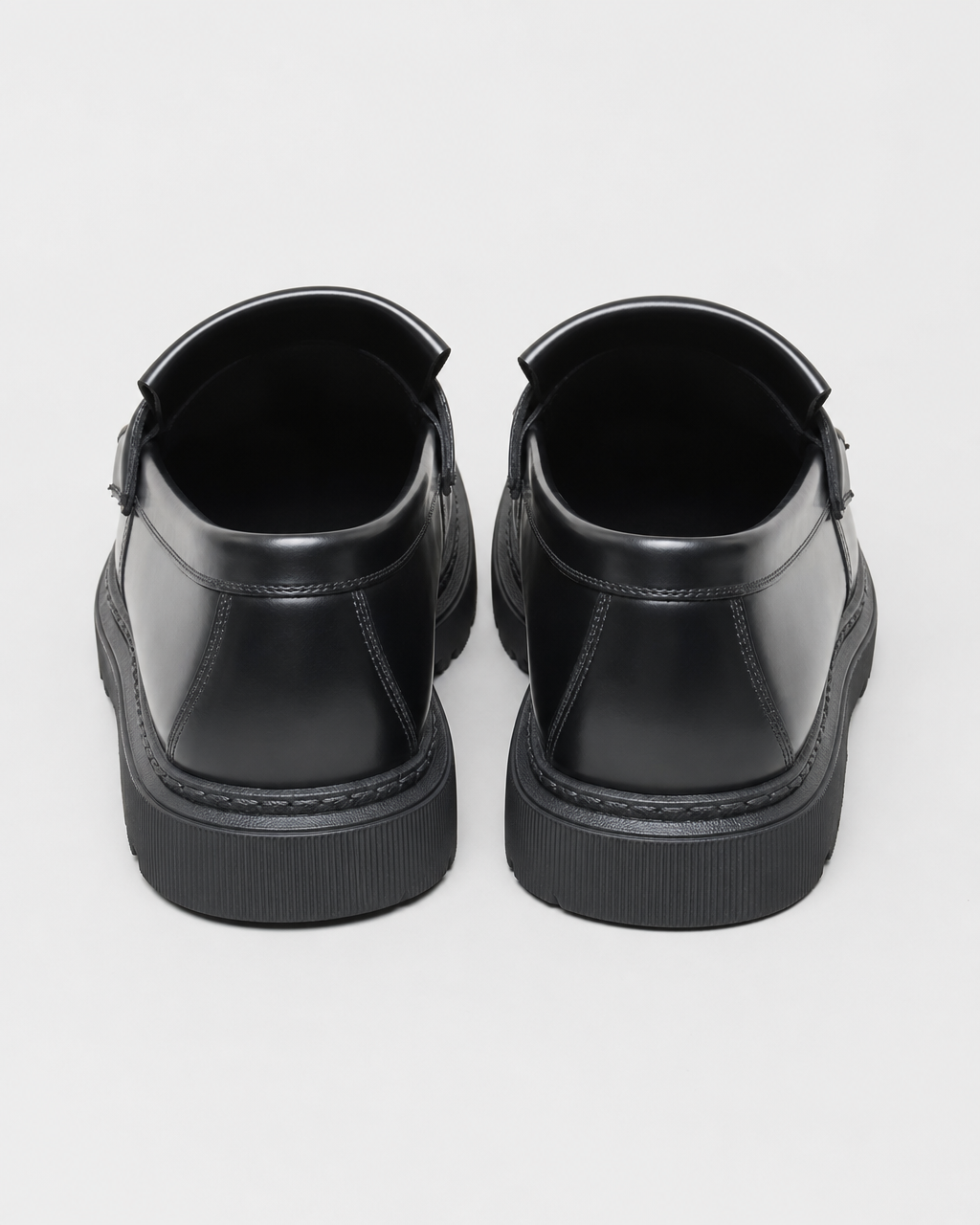 Black penny heel view