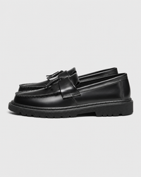 Black penny side view