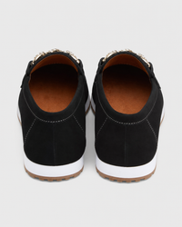 Black platform heel view