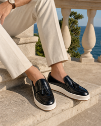 Man wearing black platform with linen trousers