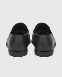 Black platform heel view