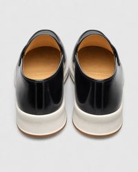 Black platform heel view