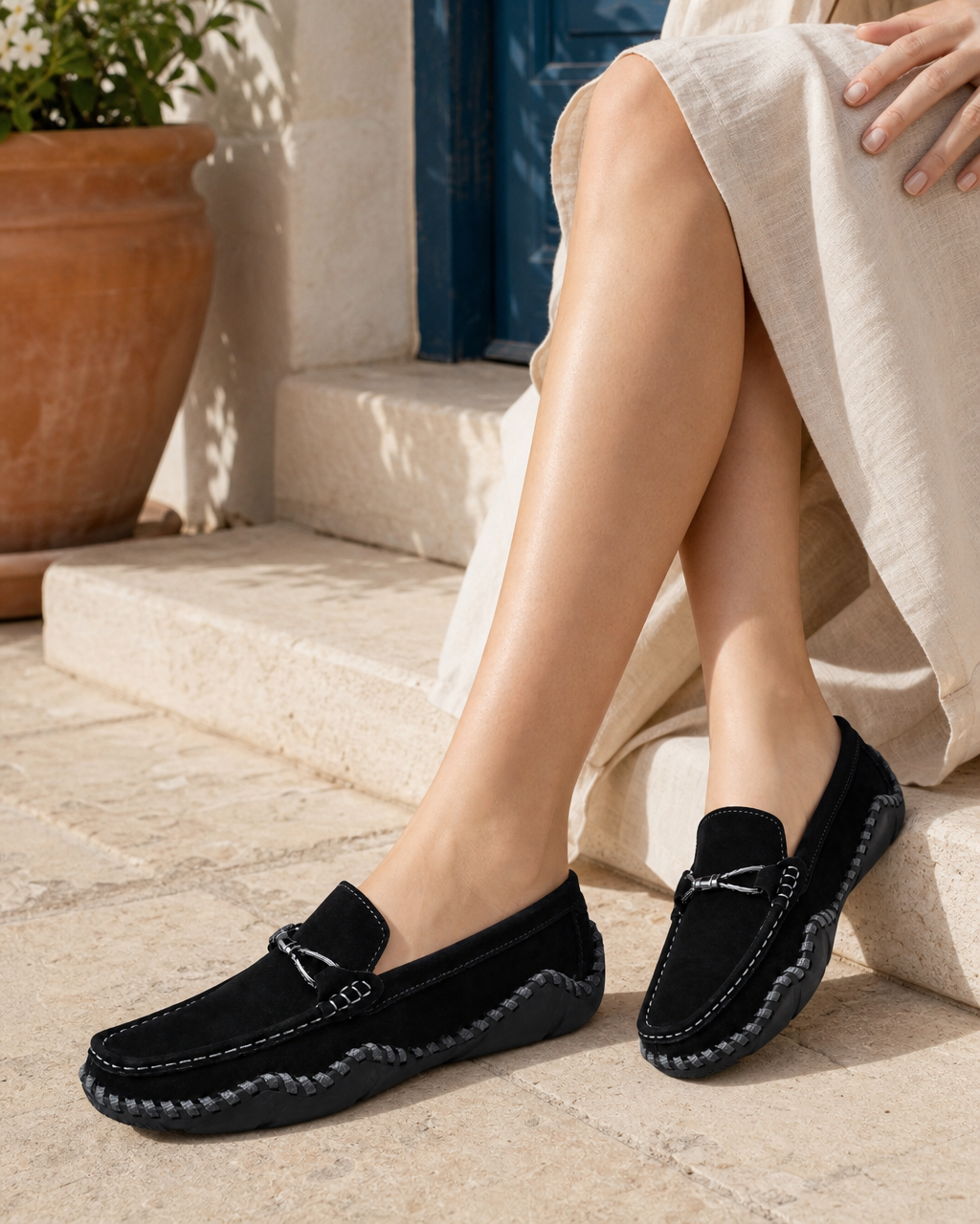 Woman wearing black slip on