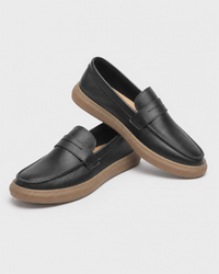 Pair of black slip on