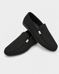 Pair of black slip on