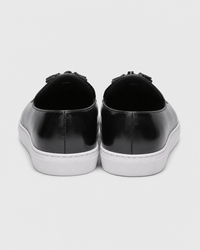 Black tassel heel view