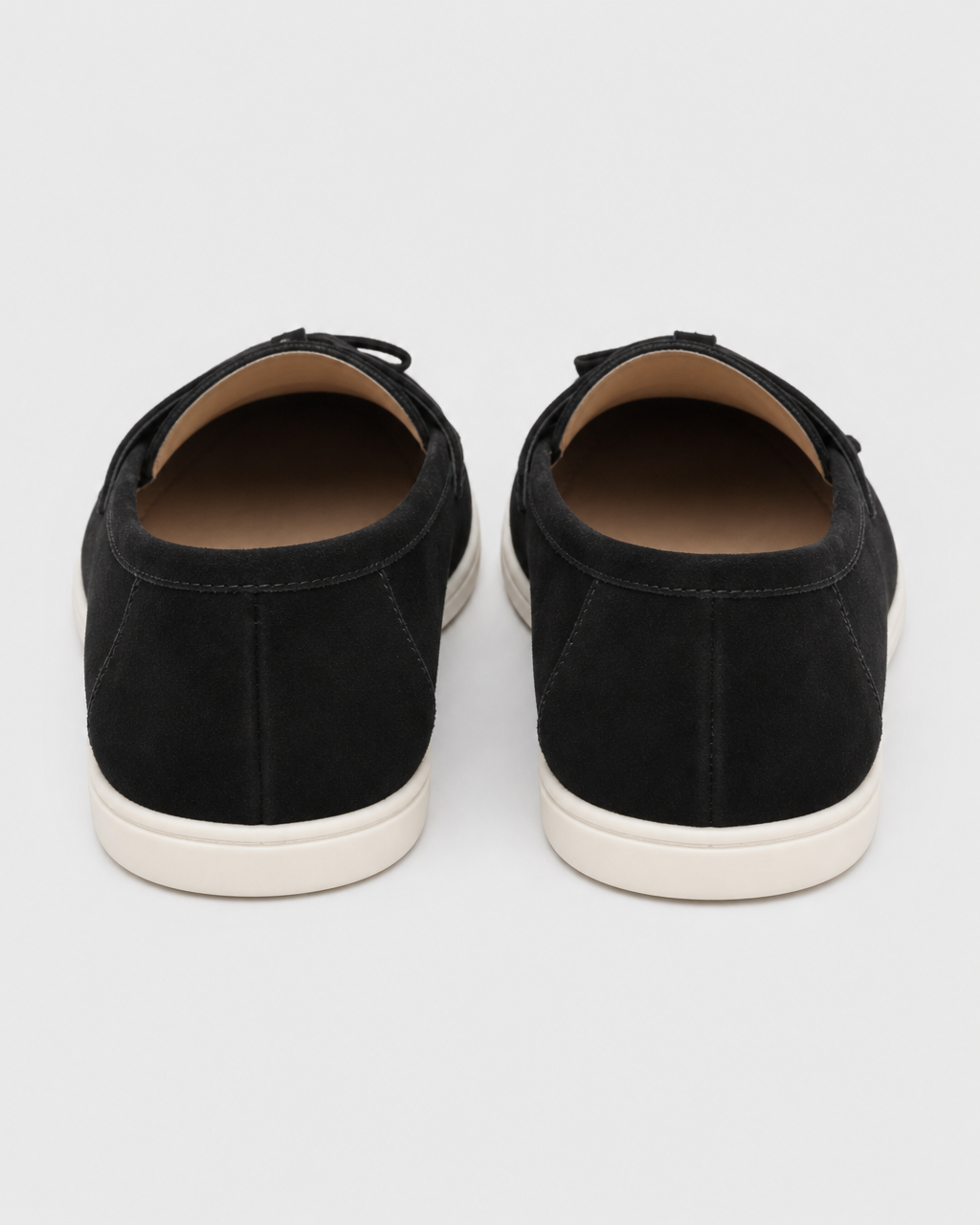 Black tassel heel view