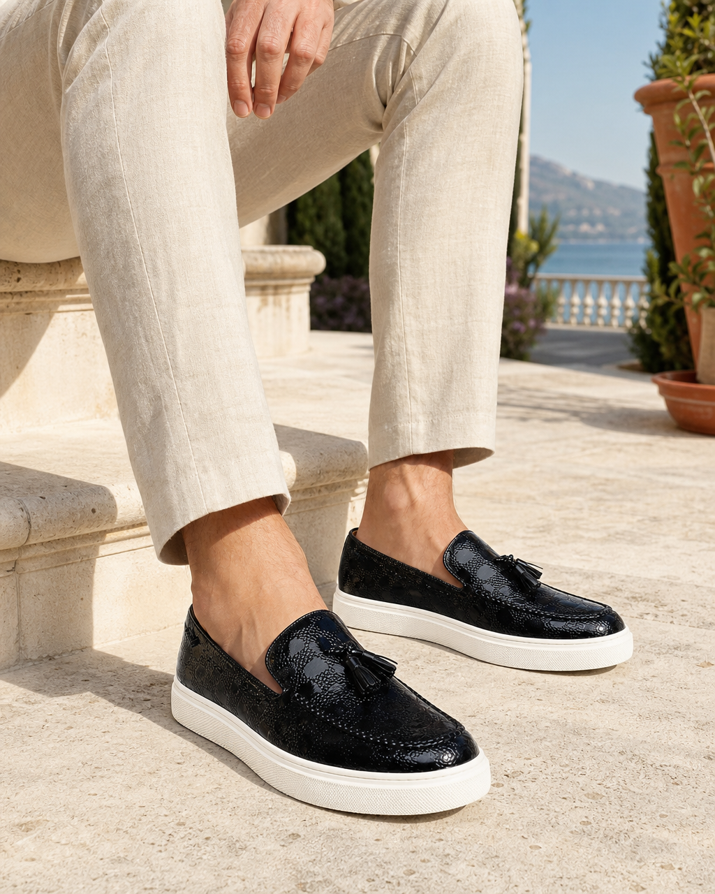 Man wearing black tassel with linen trousers