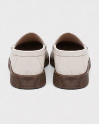 Cream flat heel view