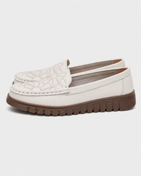Cream flat side view