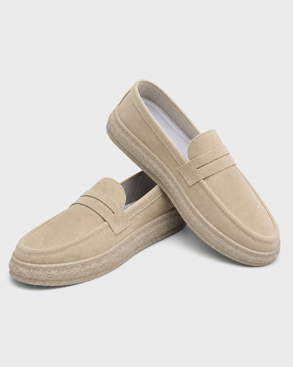 Pair of cream slip on