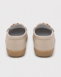 Cream tassel heel view