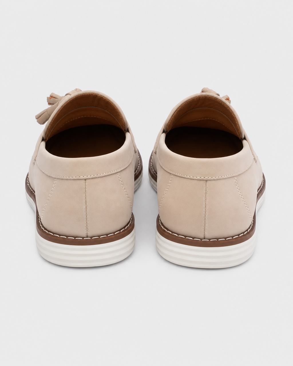 Cream tassel heel view
