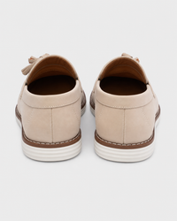 Cream tassel heel view