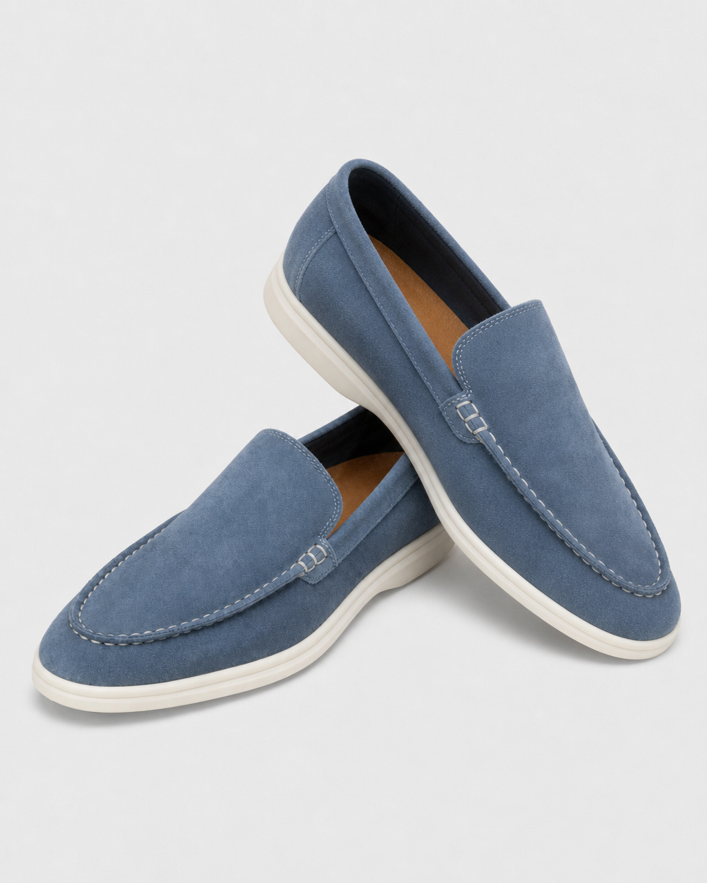 Pair of denim blue slip on