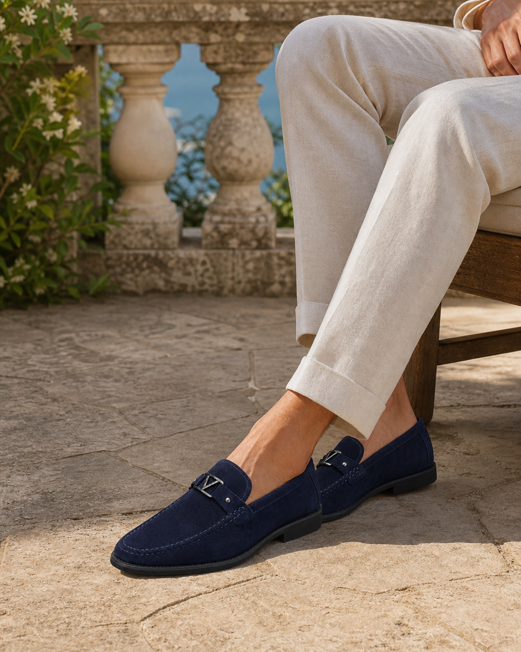 Man wearing navy driving with linen trousers