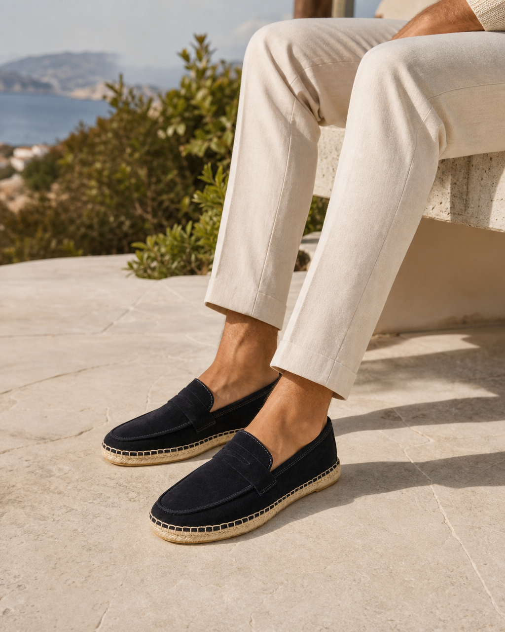 Man wearing navy espadrille with linen trousers