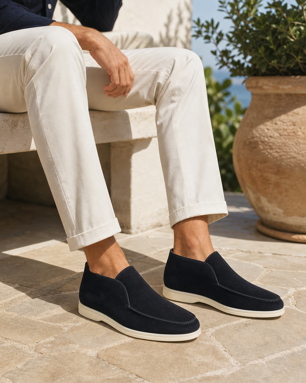 Man wearing navy high top with linen trousers