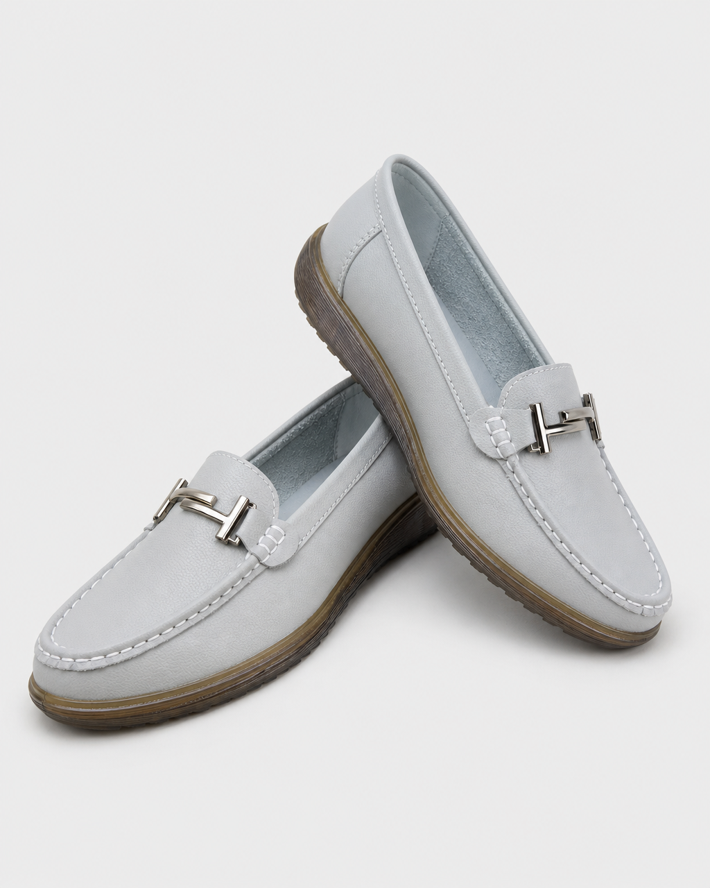 Pair of pale blue flat