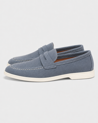 Slate blue penny side view