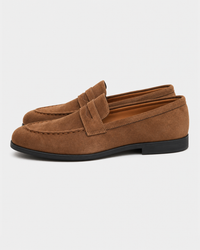 Tan penny side view